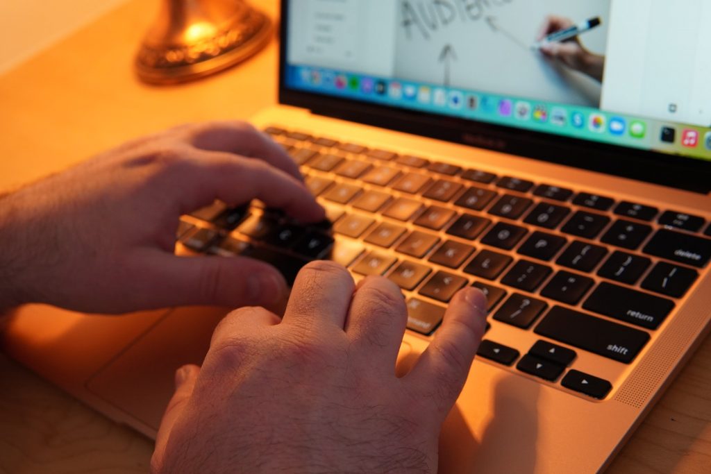 a person installing the best WordPress plugins for freelancers