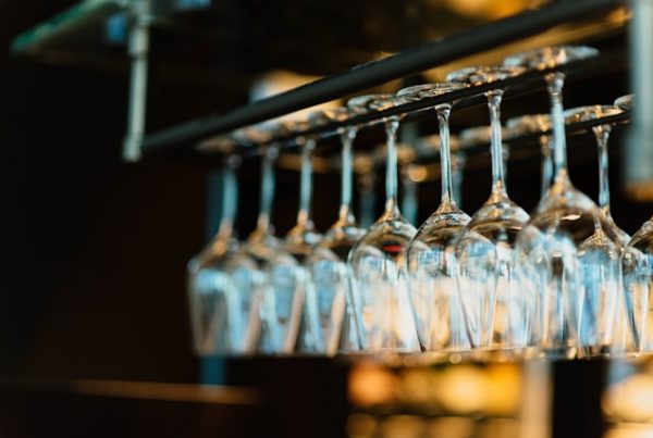 Picture of hanging wine glasses in one of the must-visit places in Washington State